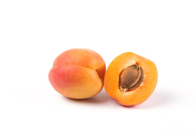 Yellow peaches isolated on white