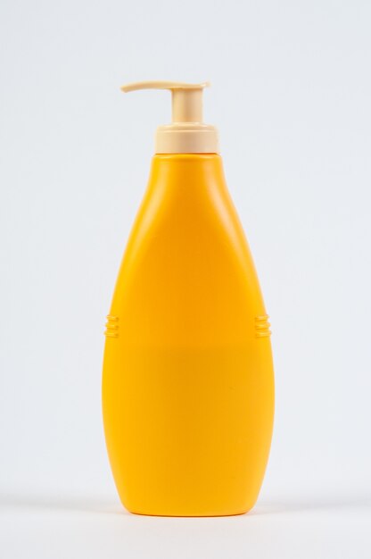 Download Premium Photo Yellow Plastic Pump Soap Bottle Without Label Isolated On White Wall Yellowimages Mockups