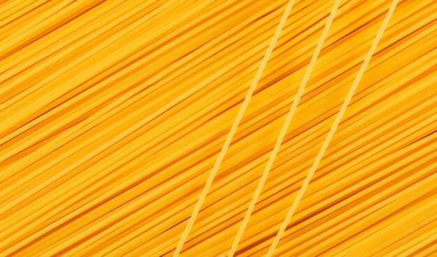 Yellow raw spaghetti.