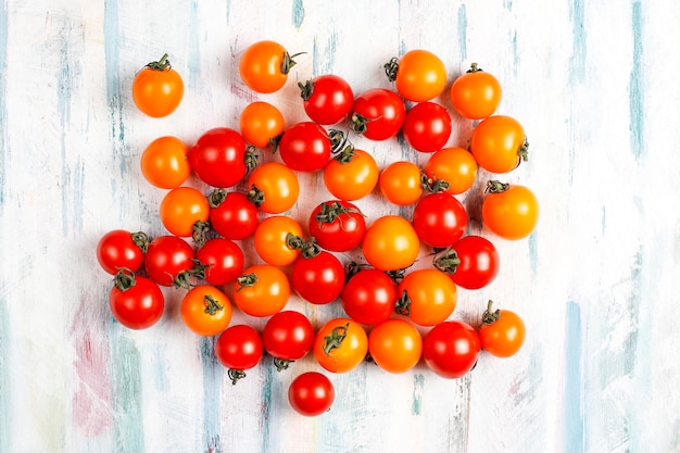 Free photo yellow and red cherry tomatoes.