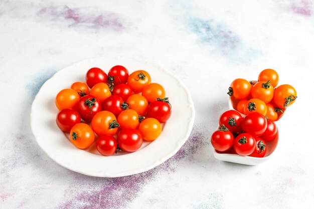 Yellow and red cherry tomatoes.