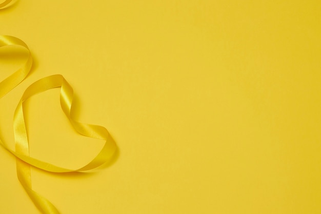 Yellow ribbon on yellowish background