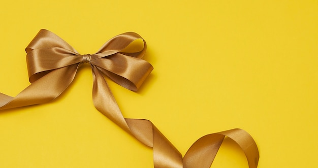 Yellow ribbon on yellowish background