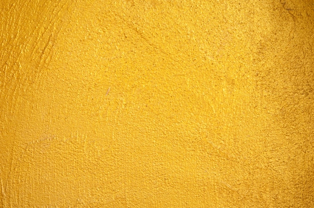 黄色の粗い壁テクスチャ