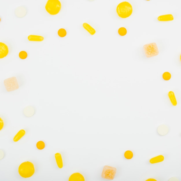 Yellow spread candies on table