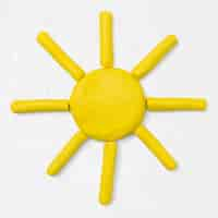 Free photo yellow sun clay craft cute handmade creative art graphic