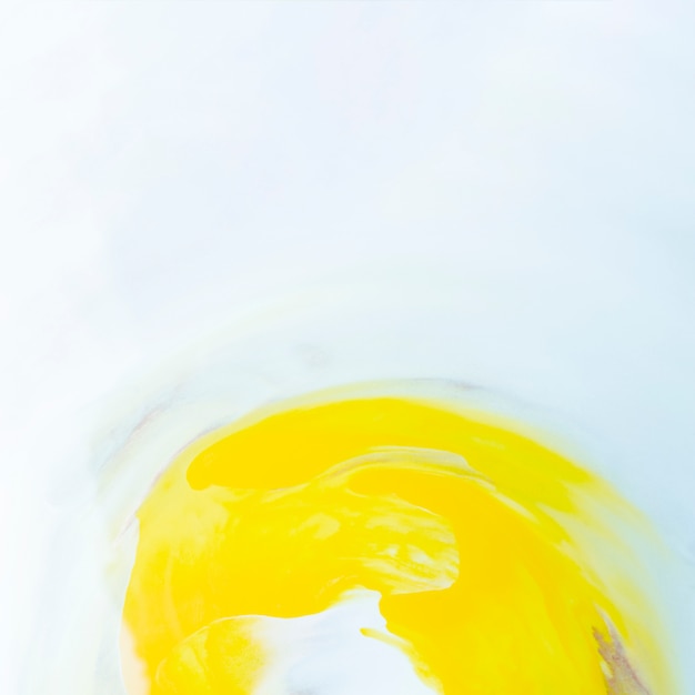 Free photo yellow water color brushstroke on white paper