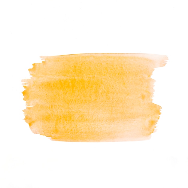 Желтый акварельный рисованный кисть на белой бумаге