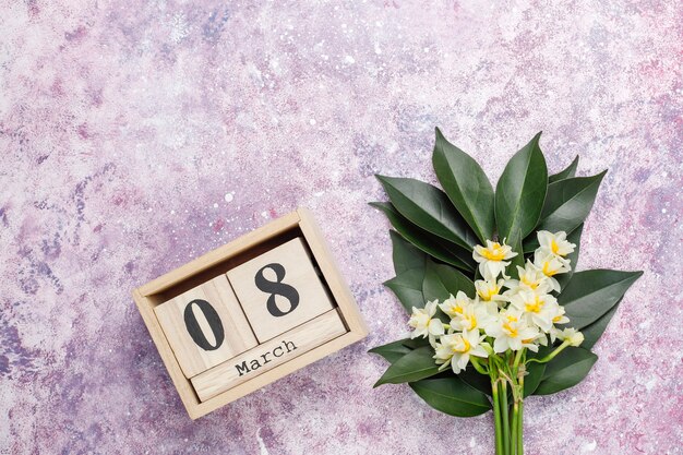 Yellow white daffodil, narcissus, jonquil flower on bright background.March 8 women's day.