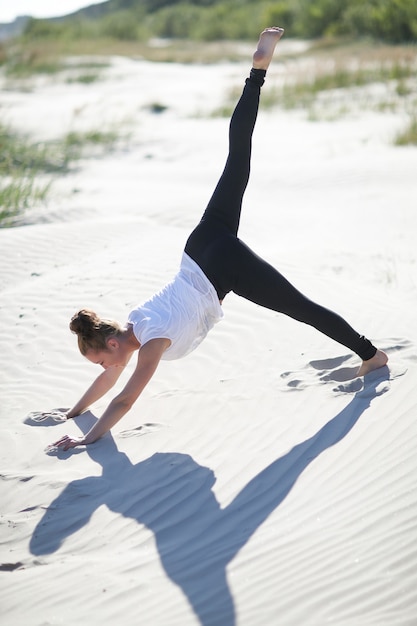 Free photo yoga on the beach