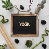 Free photo yoga lettering on chalkboard