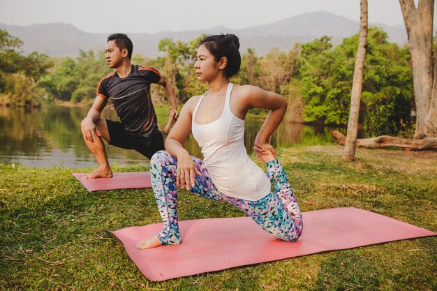 Yoga partners with gorgeous nature