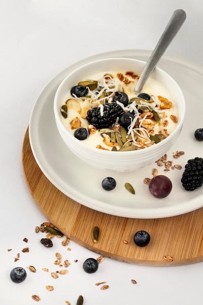 Yogurt bowl with fruits and cereals high angle