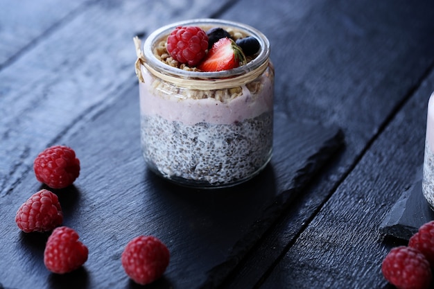 Yogurt with chia seed and berries in glass