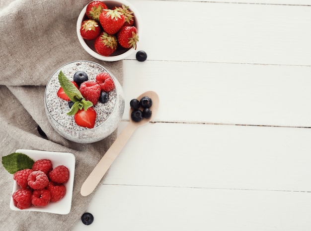 Yogurt with chia seed and berries in glass