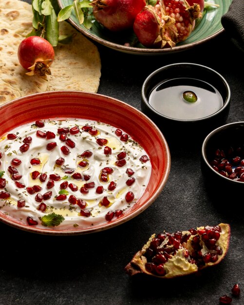 Yogurt with pomegranate and olive oil