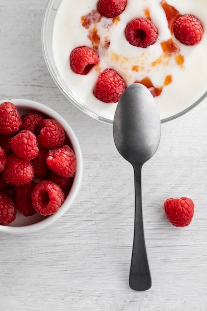 Yogurt with raspberries top view