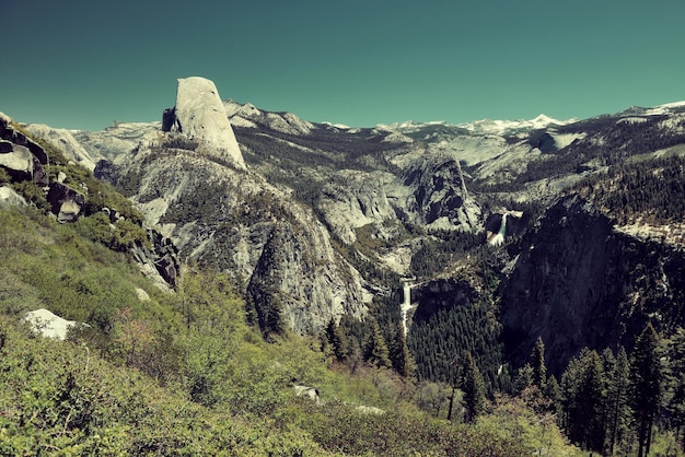 Yosemite mountain ridge with waterfall.