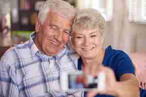 Free photo you are never too old to take a selfie