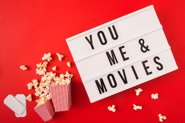 You and me cinema lettering on red background