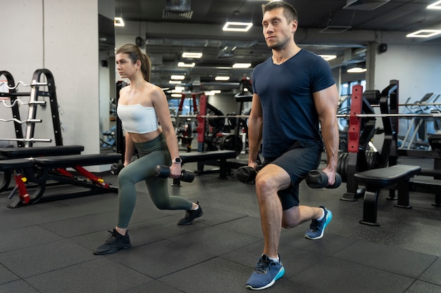 Young adult doing indoor sport at the gym