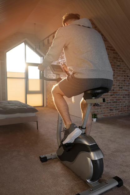 Young adult exercising at home