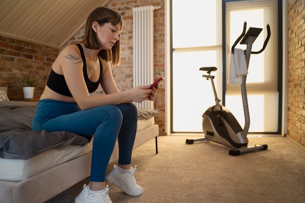 Young adult exercising at home