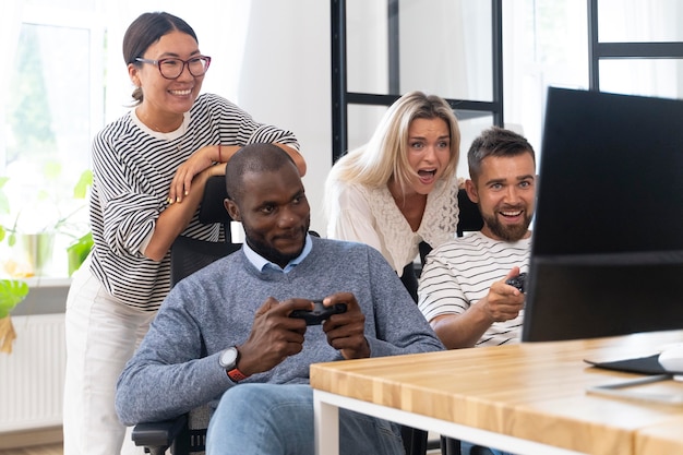 Young adult friends having fun while playing video games