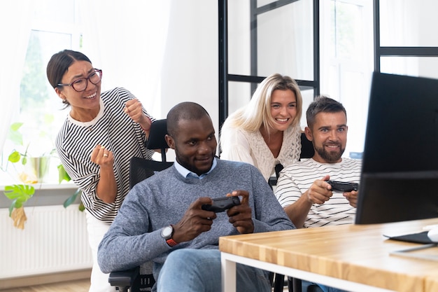 Young adult friends having fun while playing video games