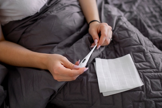 Young adult at home suffering from illness