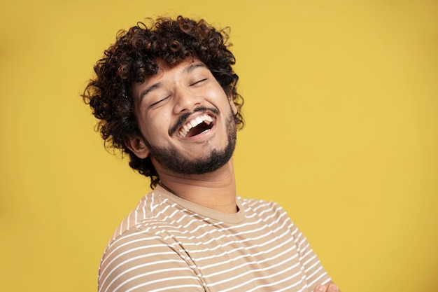 Free photo young adult man smiling