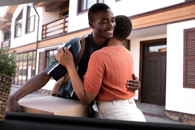 Young adult moving from his parents house