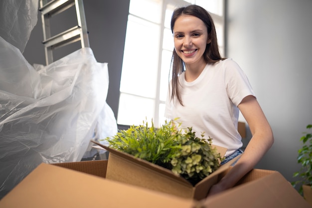 Free photo young adult moving into a new home