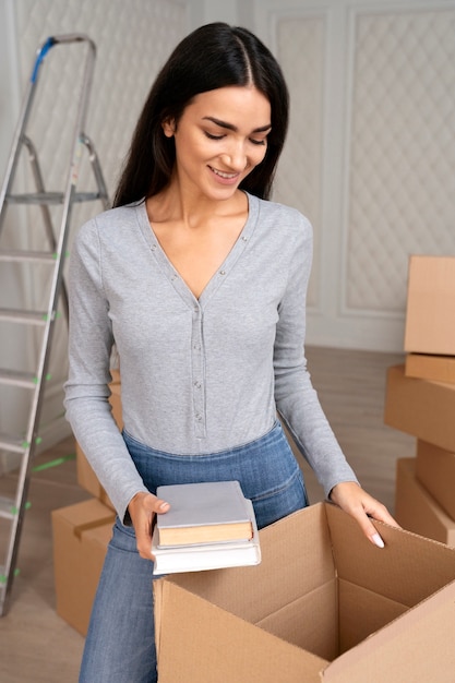 Free photo young adult moving into new home