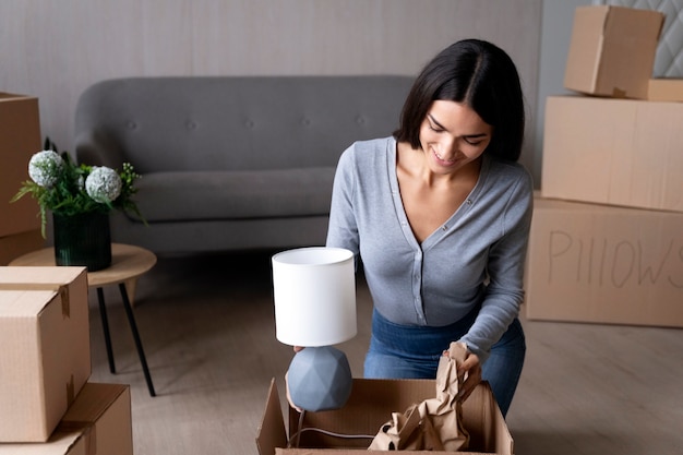 Free photo young adult moving into new home