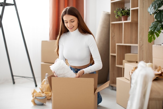 Free photo young adult moving in new house