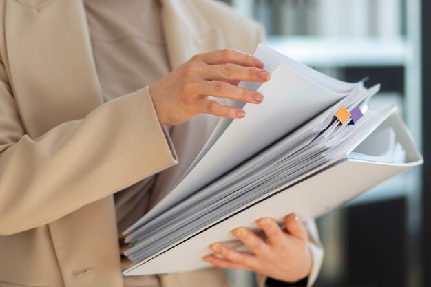 Free photo young adult organizing documents