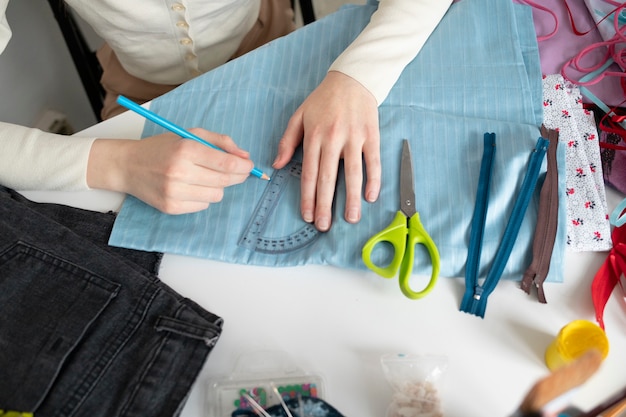 Free photo young adult reusing fabric material