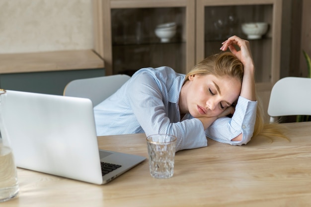 Free photo young adult sleeping while reading