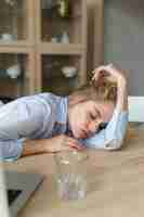 Free photo young adult sleeping while reading