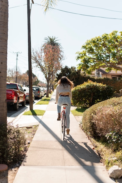 Young adult traveling using sustainable mobility