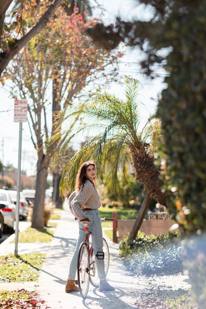 Young adult traveling using sustainable mobility