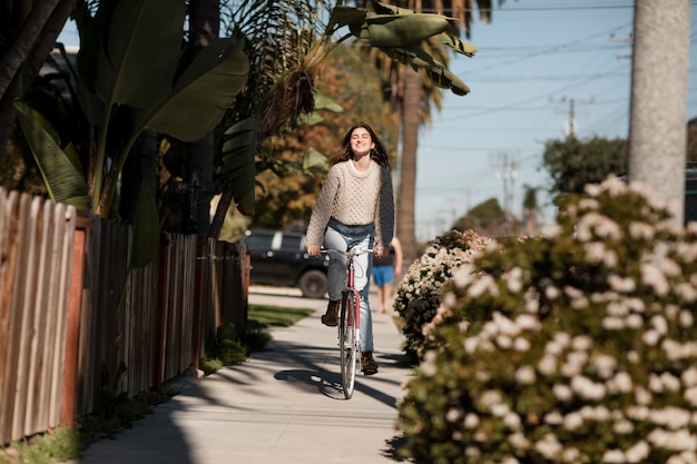 Young adult traveling using sustainable mobility