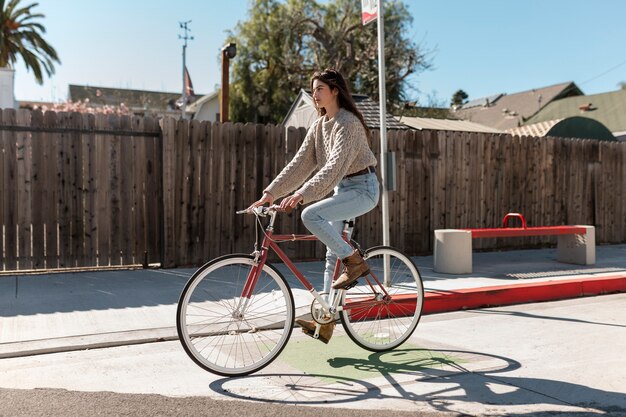 Young adult traveling using sustainable mobility