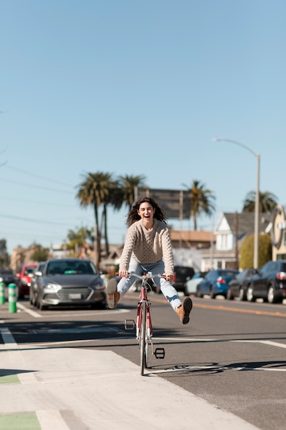 Free photo young adult traveling using sustainable mobility