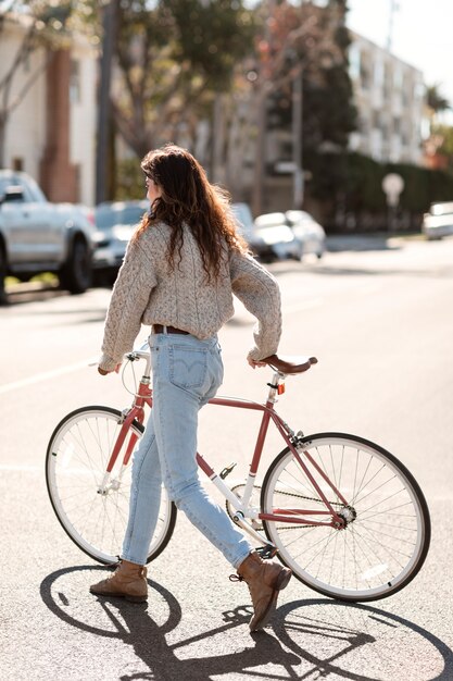 Young adult traveling using sustainable mobility