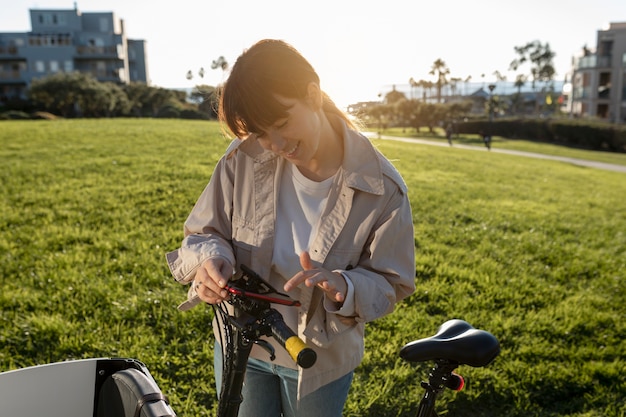 Young adult traveling using sustainable mobility