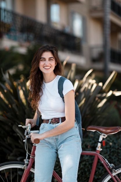 Young adult traveling using sustainable mobility