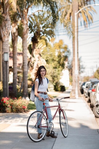 Young adult traveling using sustainable mobility