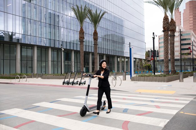 Young adult traveling using sustainable mobility